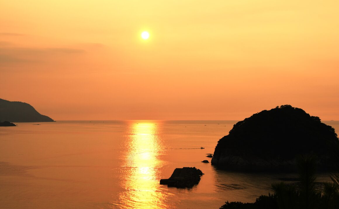 The Sea of Japan glows red in the sunset,  one of "Japan's 100 Most Beautiful Sunsets"